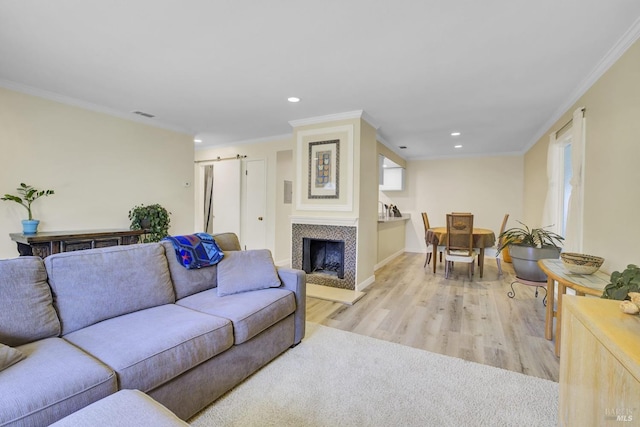 131 Roundtree Blvd, San Rafael, CA 94903 - living area with light wood finished floors, recessed lighting, ornamental molding, a fireplace, and baseboards