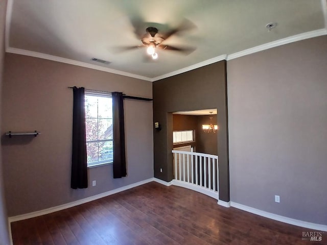 2743 Overlook Dr, Vallejo, CA 94591 - unfurnished room featuring a ceiling fan, dark wood-style floors, a chandelier, baseboards, and crown molding