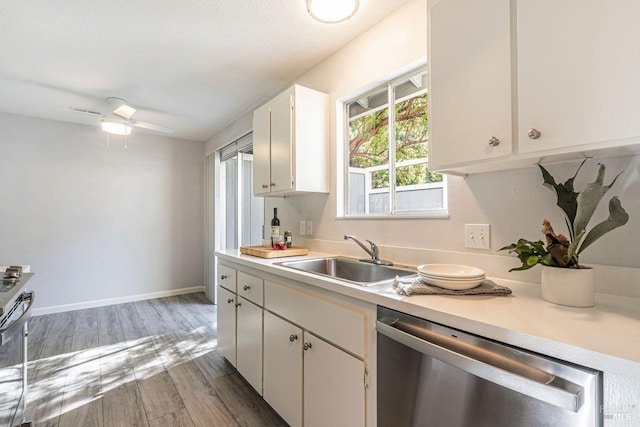 106 Oliva Ct Unit A, Novato, CA 94947 - kitchen with dishwasher, a sink, light countertops, white cabinets, and wood finished floors