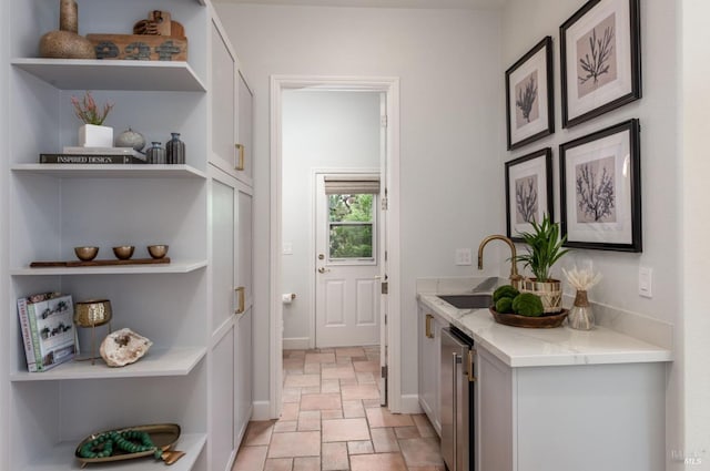 4588 Bennett Valley Rd, Santa Rosa, CA 95404 - laundry room with stone tile flooring and wine cooler