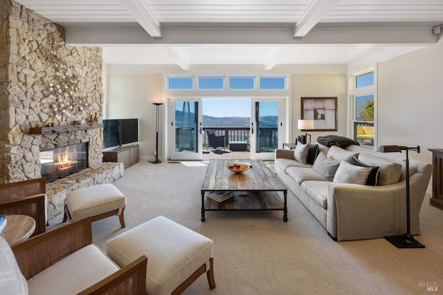 2557 Trinity Rd, Glen Ellen, CA 95442 - living area with light colored carpet, beamed ceiling, and a fireplace