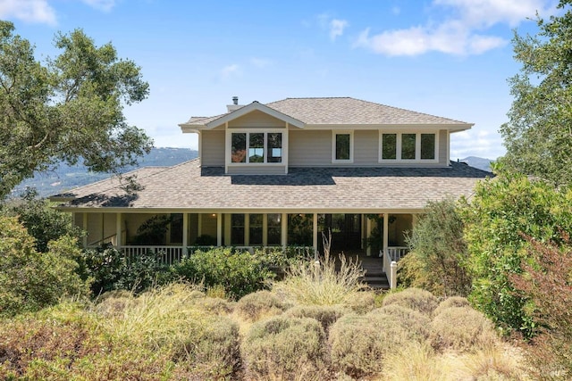 2557 Trinity Rd, Glen Ellen, CA 95442 - view of front facade with roof with shingles, covered porch, and a chimney
