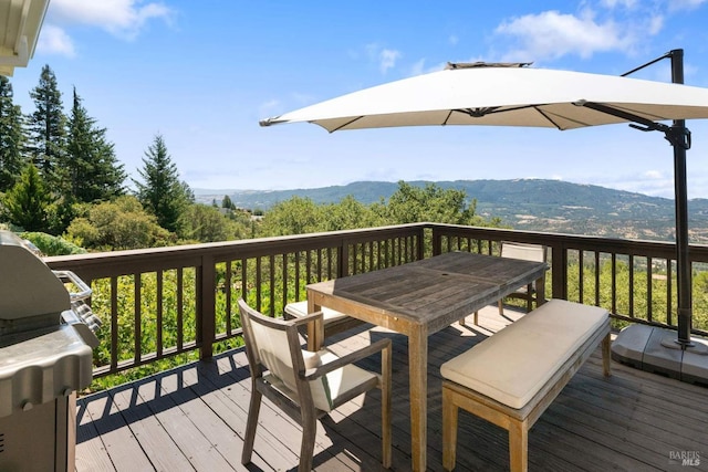2557 Trinity Rd, Glen Ellen, CA 95442 - wooden deck featuring outdoor dining area, a mountain view, and a grill