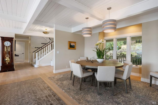 2557 Trinity Rd, Glen Ellen, CA 95442 - dining room with wood finished floors, baseboards, stairs, and wooden ceiling with exposed beams