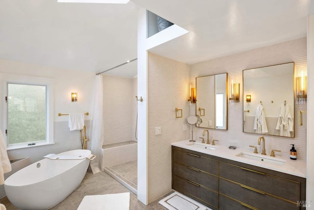 2557 Trinity Rd, Glen Ellen, CA 95442 - full bath featuring tiled shower, tile walls, double vanity, and a freestanding tub
