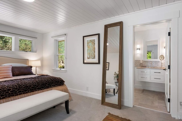 2557 Trinity Rd, Glen Ellen, CA 95442 - bedroom with wooden ceiling, light colored carpet, ensuite bath, and baseboards