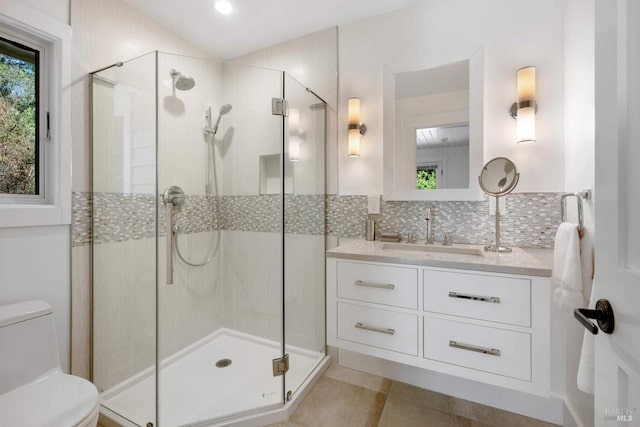 2557 Trinity Rd, Glen Ellen, CA 95442 - full bathroom featuring toilet, vanity, a stall shower, tasteful backsplash, and tile patterned floors