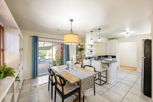 238 Ebbetts Pass Rd, Vallejo, CA 94589 - dining room featuring light tile patterned floors, baseboards, and a ceiling fan