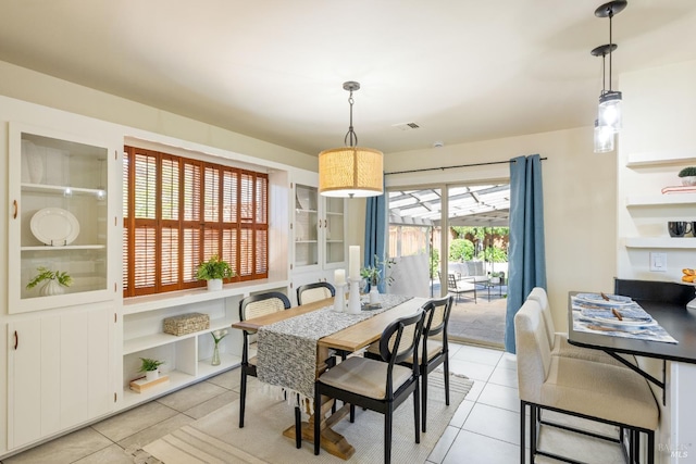 238 Ebbetts Pass Rd, Vallejo, CA 94589 - dining space featuring light tile patterned flooring and built in shelves