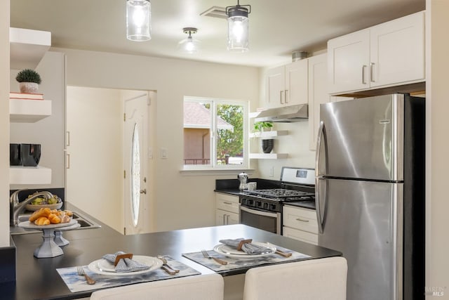 238 Ebbetts Pass Rd, Vallejo, CA 94589 - kitchen with stainless steel appliances, under cabinet range hood, a sink, white cabinetry, and a peninsula
