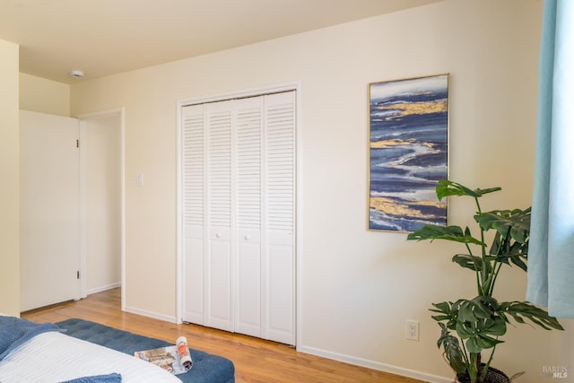 238 Ebbetts Pass Rd, Vallejo, CA 94589 - bedroom with light wood finished floors, baseboards, and a closet