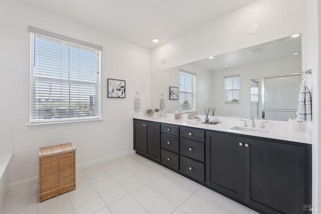 2413 Village Square Blvd, Fairfield, CA 94533 - full bathroom featuring double vanity, baseboards, an enclosed shower, tile patterned floors, and recessed lighting