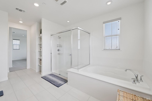 2413 Village Square Blvd, Fairfield, CA 94533 - full bath featuring a garden tub, a shower stall, tile patterned floors, and recessed lighting