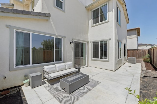 2413 Village Square Blvd, Fairfield, CA 94533 - fenced backyard featuring an outdoor hangout area, a patio, and central AC unit