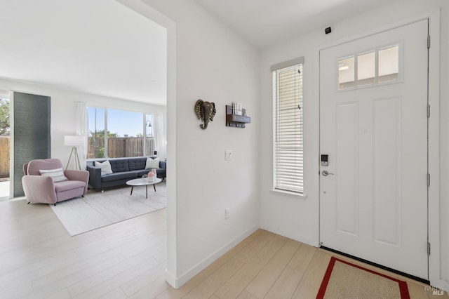 2413 Village Square Blvd, Fairfield, CA 94533 - entryway featuring light wood-style flooring and baseboards