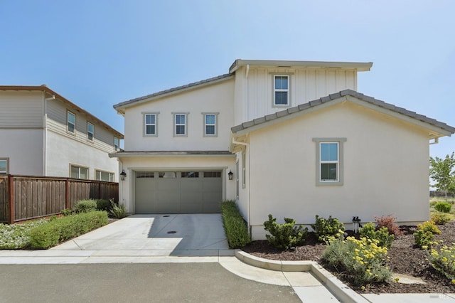 2413 Village Square Blvd, Fairfield, CA 94533 - traditional home with a garage, concrete driveway, stucco siding, and board and batten siding