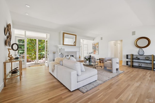 37 Rancheria Rd, Kentfield, CA 94904 - living room with light wood-type flooring, vaulted ceiling, a fireplace, and recessed lighting