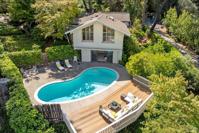 37 Rancheria Rd, Kentfield, CA 94904 - view of swimming pool featuring a wooden deck, a patio, and view of wooded area