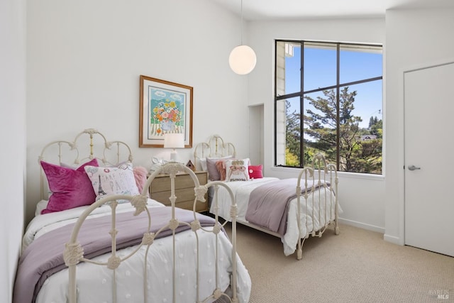 37 Rancheria Rd, Kentfield, CA 94904 - carpeted bedroom featuring multiple windows, lofted ceiling, and baseboards