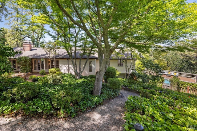37 Rancheria Rd, Kentfield, CA 94904 - view of property exterior with a chimney and french doors