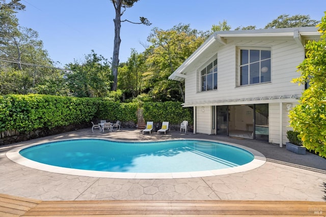 37 Rancheria Rd, Kentfield, CA 94904 - view of swimming pool with a patio area and view of wooded area