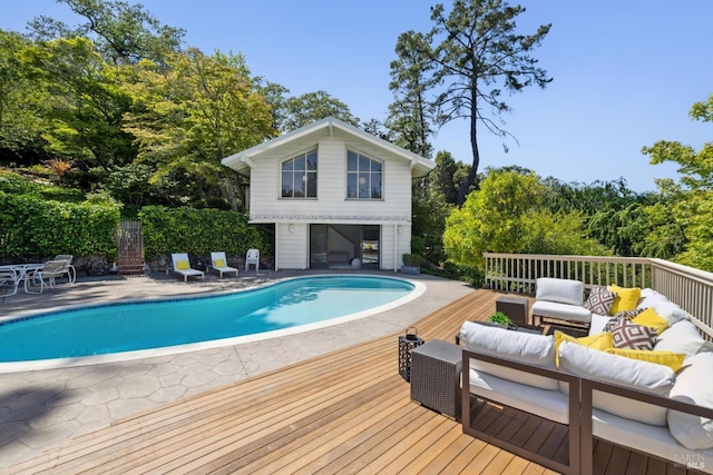 37 Rancheria Rd, Kentfield, CA 94904 - view of swimming pool with a wooden deck, an outdoor living space, and view of wooded area