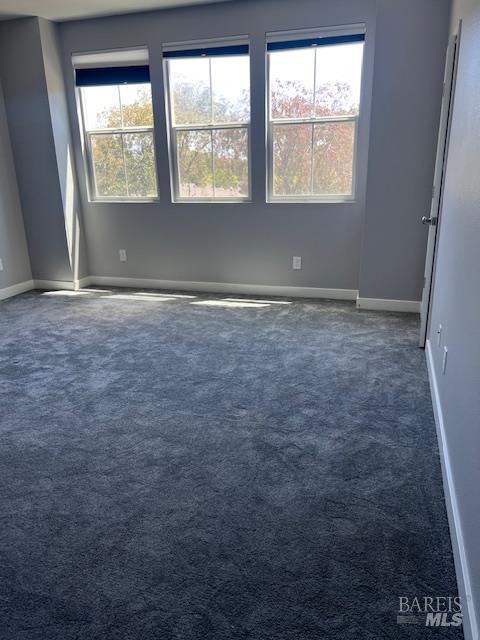 126 Johnson St, Windsor, CA 95492 - carpeted empty room with plenty of natural light and baseboards
