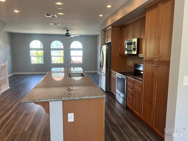 126 Johnson St, Windsor, CA 95492 - kitchen with stainless steel appliances, a sink, dark wood-type flooring, a ceiling fan, and recessed lighting