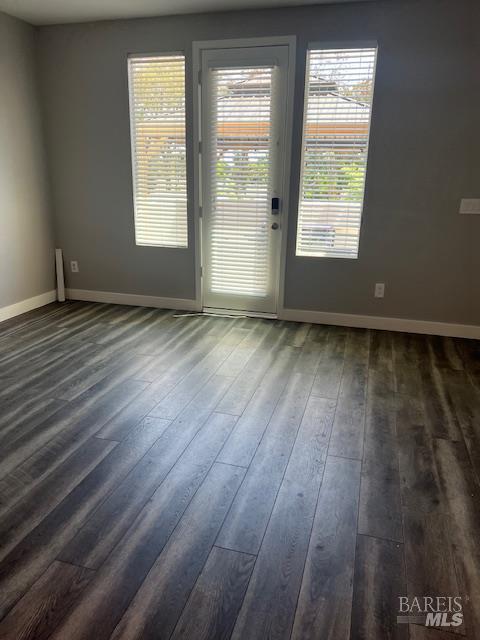 126 Johnson St, Windsor, CA 95492 - unfurnished room with dark wood-type flooring and baseboards