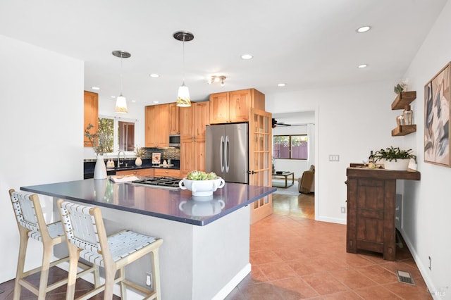 480 Via Del Plano, Novato, CA 94949 - kitchen with stainless steel appliances, dark countertops, a sink, recessed lighting, and light tile patterned flooring