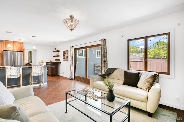 480 Via Del Plano, Novato, CA 94949 - living area with plenty of natural light, baseboards, light tile patterned floors, and a chandelier