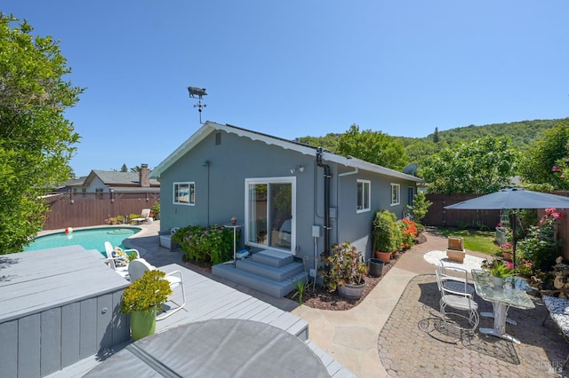 480 Via Del Plano, Novato, CA 94949 - back of property with a fenced backyard, outdoor dining area, stucco siding, and a patio