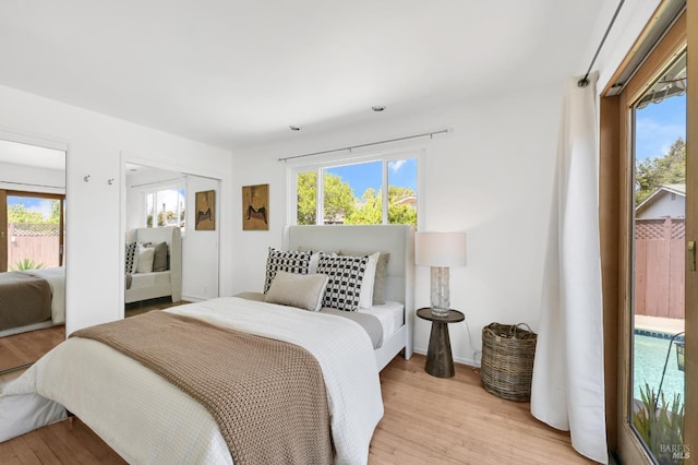 480 Via Del Plano, Novato, CA 94949 - bedroom with multiple windows and light wood-type flooring