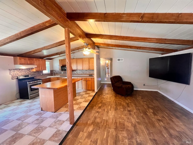 423 Gardiner Way, Rio Vista, CA 94571 - kitchen with stainless steel gas range, wooden counters, a sink, open floor plan, and backsplash