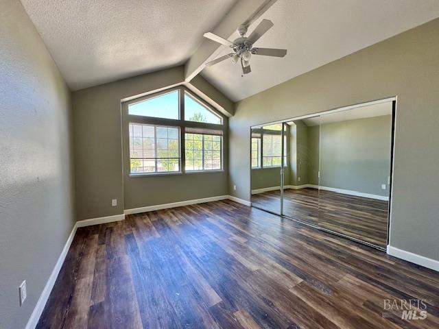 1540 Mccarthy Ct, Dixon, CA 95620 - unfurnished bedroom with wood finished floors, a closet, ceiling fan, and a textured ceiling