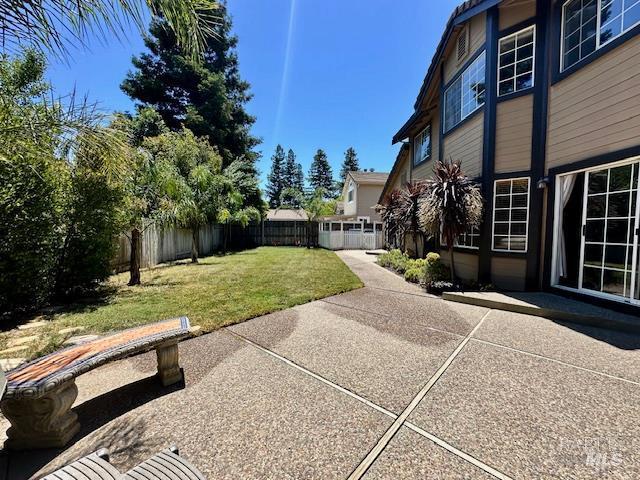 1540 Mccarthy Ct, Dixon, CA 95620 - fenced backyard featuring a patio
