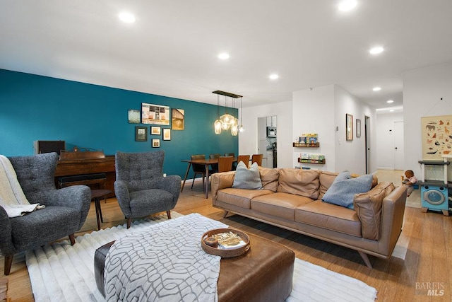 1800 London Dr, Benicia, CA 94510 - living room featuring light wood-style flooring, recessed lighting, and a chandelier