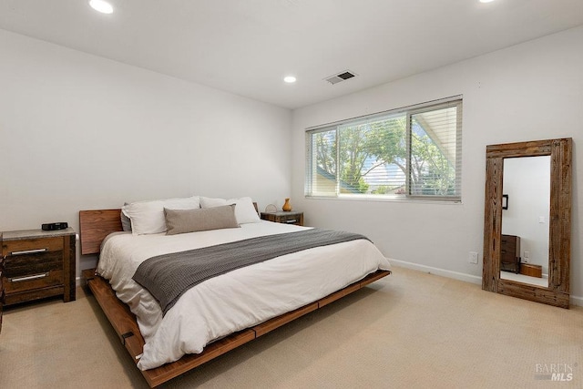 1800 London Dr, Benicia, CA 94510 - bedroom with light colored carpet, recessed lighting, and baseboards