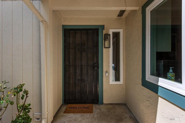 1800 London Dr, Benicia, CA 94510 - view of exterior entry featuring stucco siding
