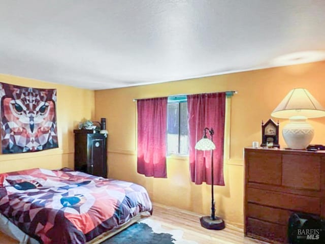 9826 Meadow Dr, Cobb, CA 95426 - bedroom with wood finished floors