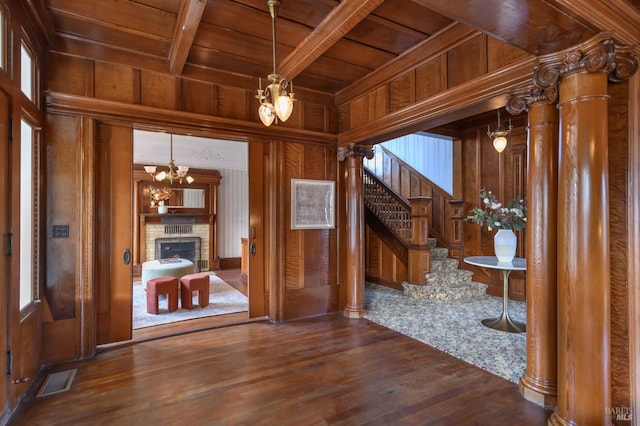 8 Keller St, Petaluma, CA 94952 - entryway with wood ceiling with exposed beams, wooden walls, a chandelier, wood finished floors, and stairs