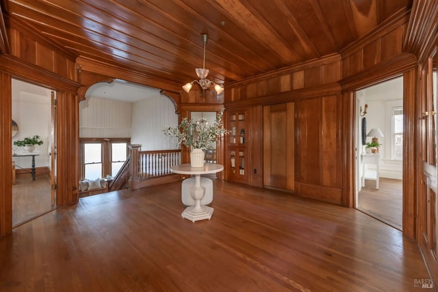 8 Keller St, Petaluma, CA 94952 - foyer with a chandelier, wood finished floors, wood walls, wood ceiling, and a decorative wall