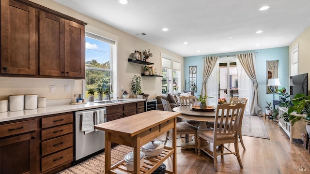 2676 Franz Kafka Ave, Santa Rosa, CA 95404 - kitchen featuring stainless steel dishwasher, a sink, recessed lighting, light wood-style flooring, and dark brown cabinetry