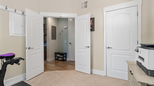 2676 Franz Kafka Ave, Santa Rosa, CA 95404 - home office with baseboards, electric panel, and light carpet