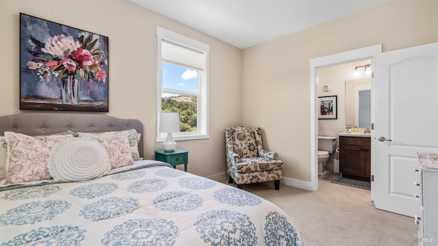 2676 Franz Kafka Ave, Santa Rosa, CA 95404 - bedroom featuring light carpet, ensuite bath, a sink, and baseboards