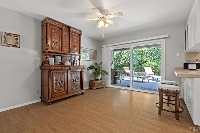 6518 Meadowgreen Pl, Santa Rosa, CA 95409 - dining room with light wood-style floors, a ceiling fan, and baseboards