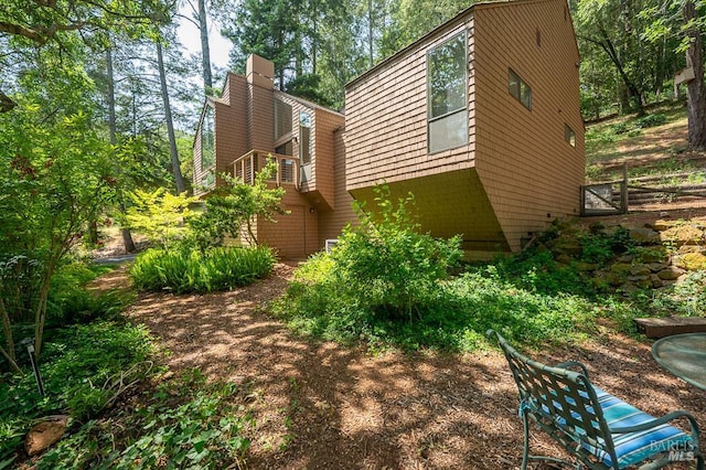 827 Wild Oak Dr, Santa Rosa, CA 95409 - view of side of home featuring a chimney