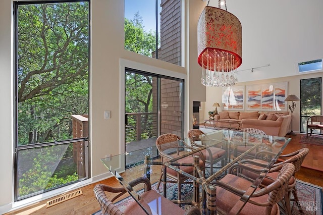 827 Wild Oak Dr, Santa Rosa, CA 95409 - dining space featuring a high ceiling and wood finished floors