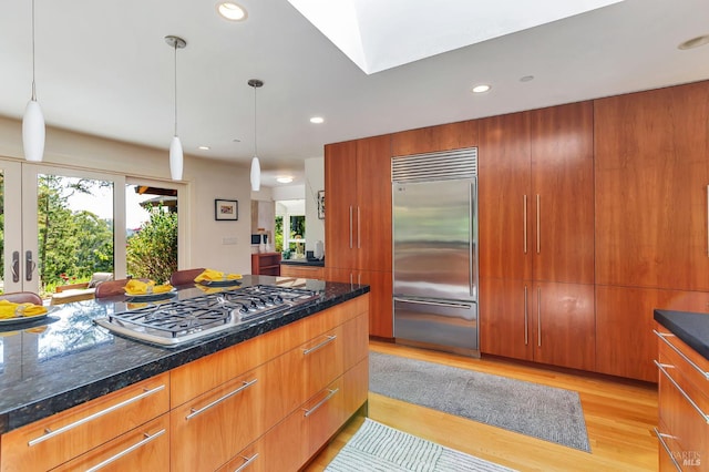 3 Wainwright Pl, Mill Valley, CA 94941 - kitchen featuring stainless steel appliances, light wood finished floors, modern cabinets, brown cabinetry, and recessed lighting
