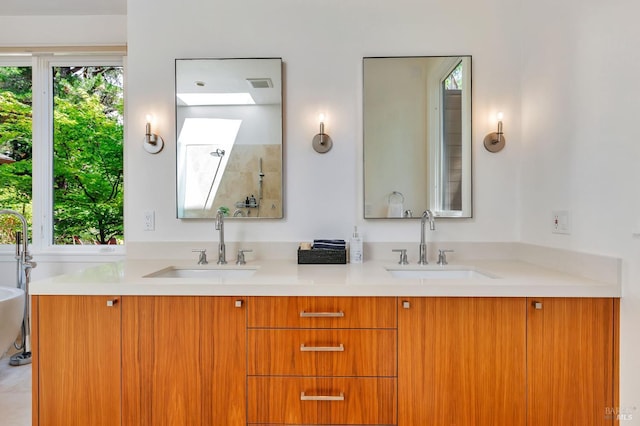 3 Wainwright Pl, Mill Valley, CA 94941 - bathroom with double vanity, plenty of natural light, and a freestanding bath